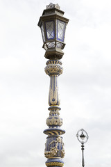 Fototapeta na wymiar Detail of one ornamental street light in the Spain Square, Sevil