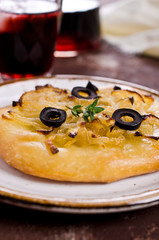 Open pie with onions