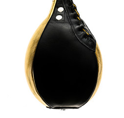 Gold and black leather boxing speed bag isloated on white.