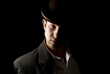 Obraz premium Portrait of young and attractive gentleman in tero style wearing