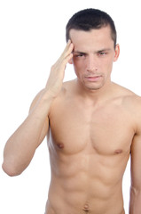 Fototapeta premium Young guy. Headache and migraine. Stress, work. Attractive young man with a pain in his head.