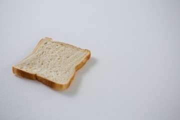 Single bread slice on white background