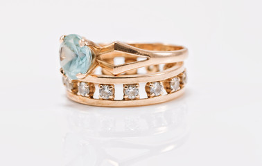 Gold ring with light Topaz and a thick ring with diamonds