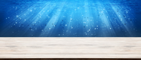 Panorama wooden tabletop with deep sea underwater ocean with wat