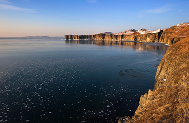 The rocky coast of the cold winter morning.