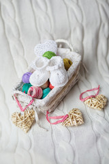 Fototapeta na wymiar Handmade creative kniting shoes for baby