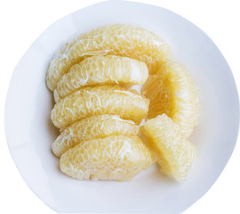 Peeled pomelo fruit isolation on white