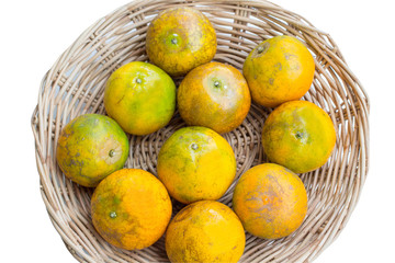 Fresh oranges on the basket