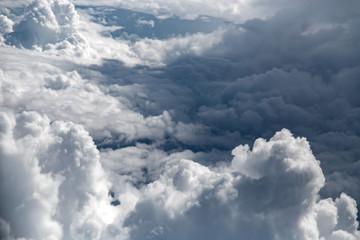 Naklejka na ściany i meble White clouds, view from above air plane window