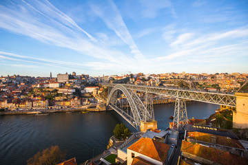 Fototapeta na wymiar View of Douro river, Ribeira and Dom Luis I bridge, Porto, Portugal.