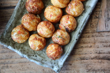 Takoyaki on wood background