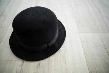 Black bowler hat in dance studio