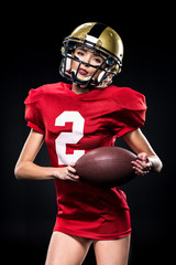 Female american football player in sportswear