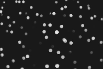 round bokeh lights background, black and white image