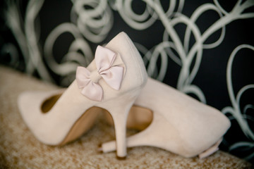 wedding shoes for bride beautiful standing in the background