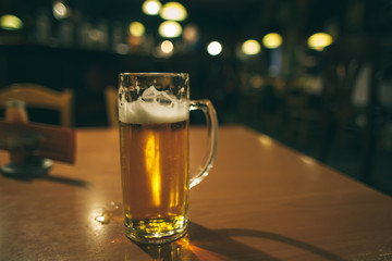 Beer glass on a bar table