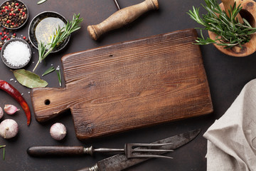 Cooking table with herbs, spices and utensils