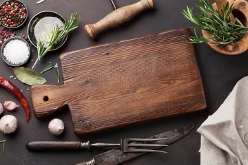 Keuken spatwand met foto Cooking table with herbs, spices and utensils © karandaev