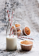 Delicious homemade cupcakes or muffins with cherry berry and milk - healthy breakfast or dessert idea for kids