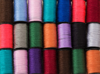 background of threads of different colors