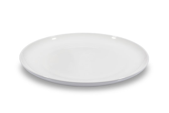 Flat empty white plate shallow on white background from side