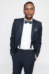 Handsome african businessman posing in studio.