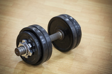 Heavy dumbbell on floor