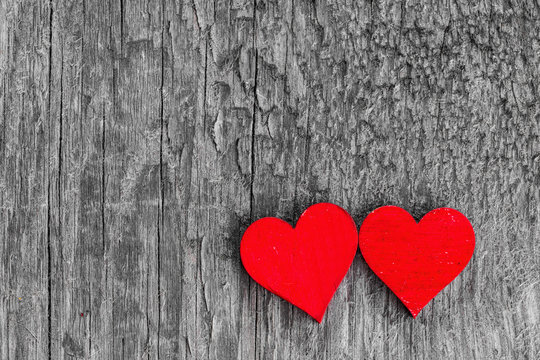 Two hearts on wood