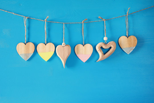 Valentines day background. hearts on wooden background