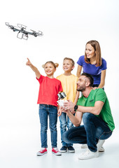 Fototapeta premium Kids using flying hexacopter drone