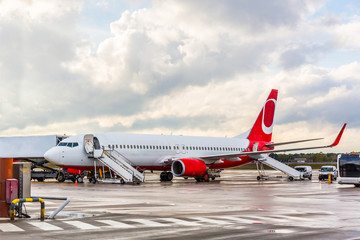 Airplane waiting for passengers at airport