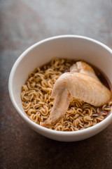 Soup Ramen noodle with chicken wing in ceramic bowl