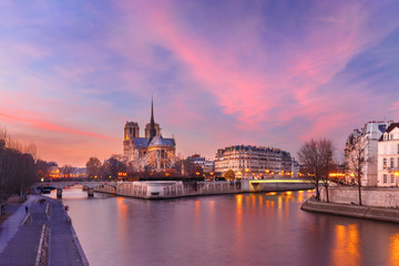 Picturesque grandiose sunset over Ile de la Cite, Seine River and Cathedral of Notre Dame de Paris,...