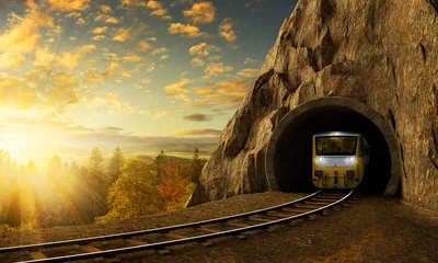 Naadloos Fotobehang Airtex Bergspoorweg met trein in tunnel in rots boven landschap. © Vlastimil Šesták