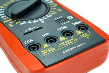 Case digital multimeter closeup on white background