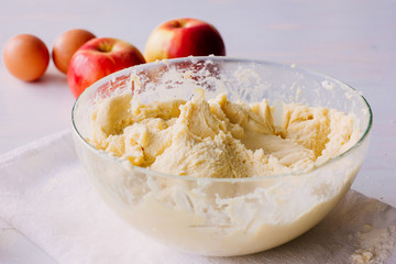 Dough for cake in glass bowl