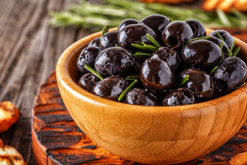 Fresh olives with toasted baguette.