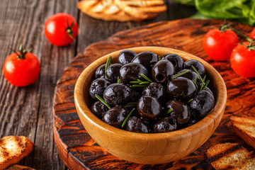 Fresh olives with toasted baguette.