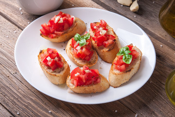 Bruschetta with tomato, onion and basil