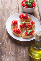 Bruschetta with tomato, onion and basil