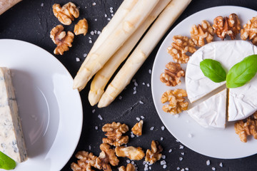 Blue cheese and camembert on plates
