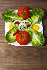 Salad plate on wood