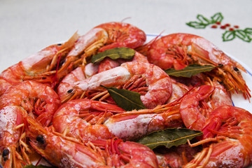 shrimp in the dish on flowered tablecloth