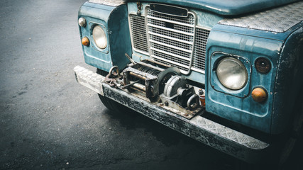Obraz premium Detail of a old vintage off-road front stop on street.