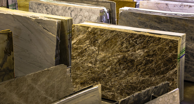 colorful samples of marble and granite counters in shop. the most popular choices for modern kitchen and bathroom remodeling.