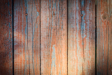 Old rustic brown wooden texture background. Natural vintage planks or board with scratches and cracks. Sunlight or sunshine on the surface