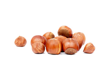 Group fresh hazelnuts isolated on white background