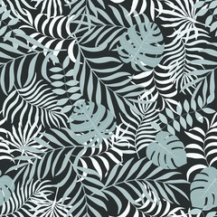 Tropical background with palm leaves. Seamless floral pattern