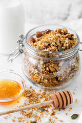Homemade granola, muesli with yogurt in glasses