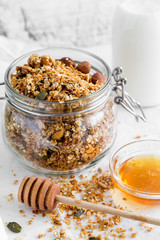 Homemade granola, muesli with yogurt in glasses